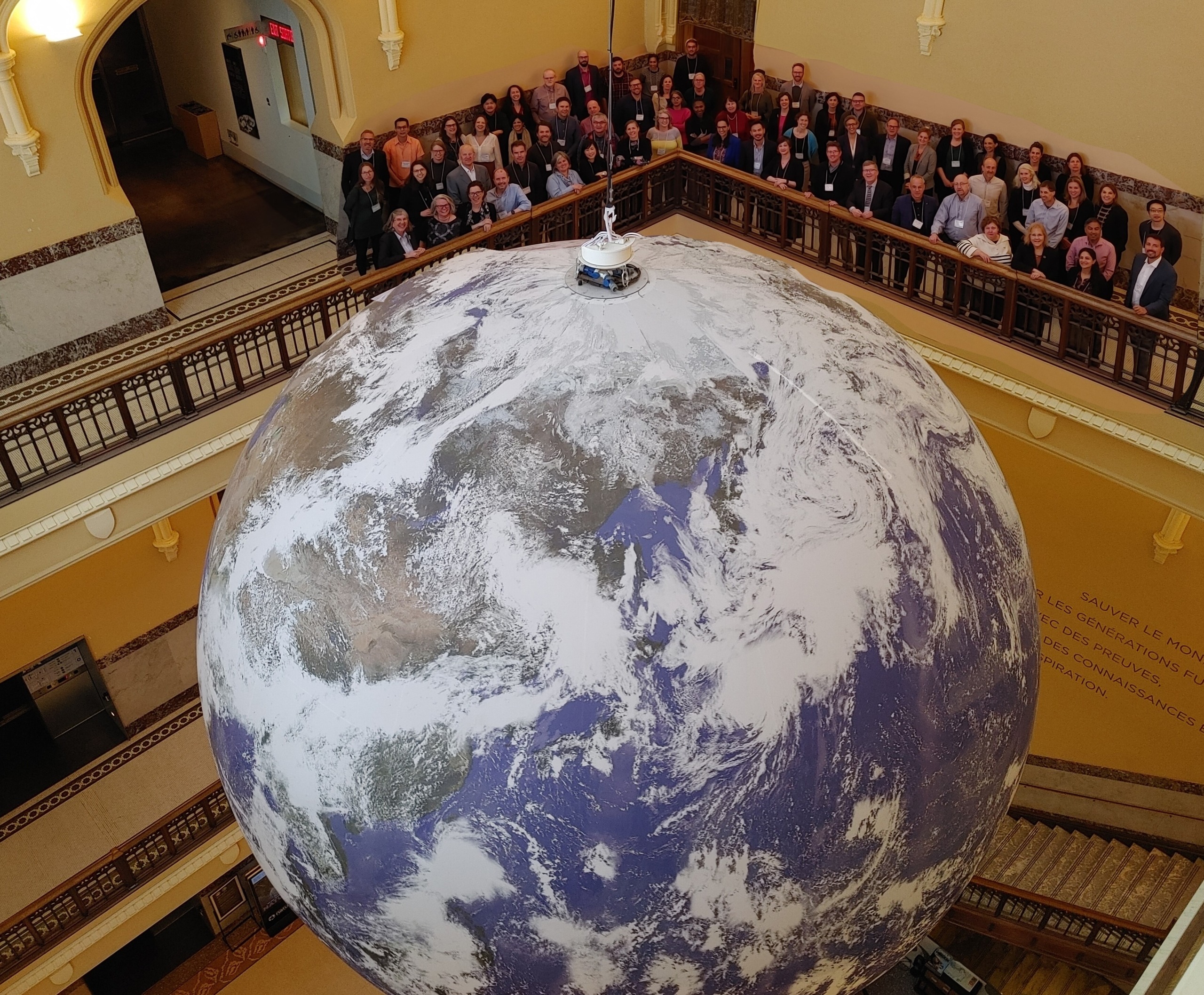 CANUE | Environments and Health Research SummitEHSI_group photo over Earth