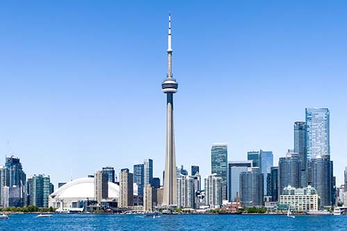 CANUE | Official HealthyPlan.City Release | November 28, 2023 | 1:00 - 2:00 p.m. (EST)Toronto skyline with blue clear sky, Canada. All branding from b